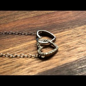 Entwined hearts necklace